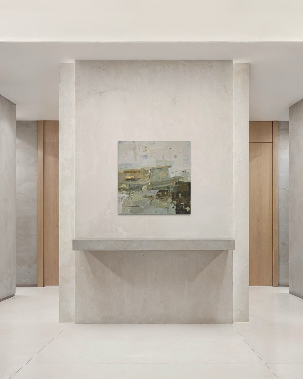 An abstract landscape painting in muted earthy tones hangs on a textured light gray stone wall above a matching stone shelf in a minimalist, modern interior hallway.