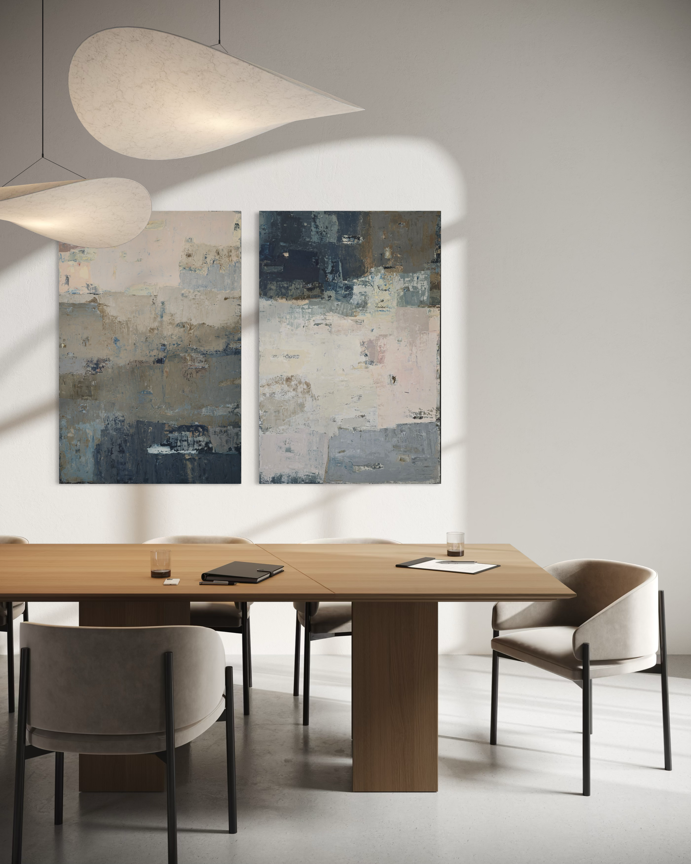 Modern dining room with wooden table, chairs, and large-scale textured, earthy tones, abstract paintings by Birute Studio.
